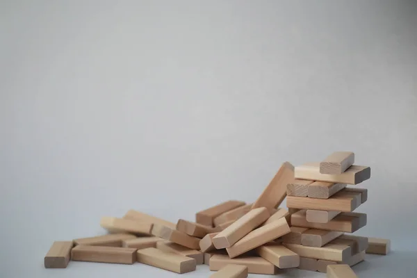 Board game jenga tower of wood sticks — Stock Photo, Image