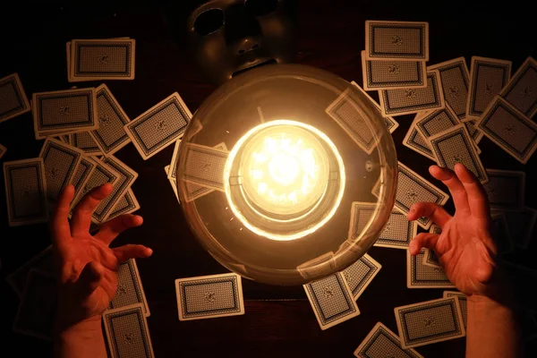 A sorcerer's table with a fortune-teller ball — Stock Photo, Image