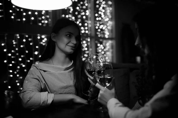 The girl in the evening in a cafe — Stock Photo, Image