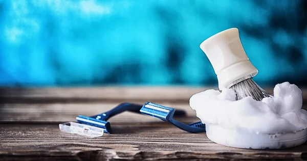 stock image Shaving accessories on a wooden texture background. Tools. Dispo