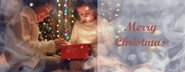 Family on Christmas eve at fireplace. Kids opening Xmas presents — Stock Photo, Image