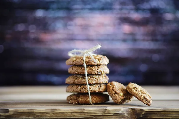 Fresh oatmeal cookies with milk on a texture wood background. Ch — Stock Photo, Image