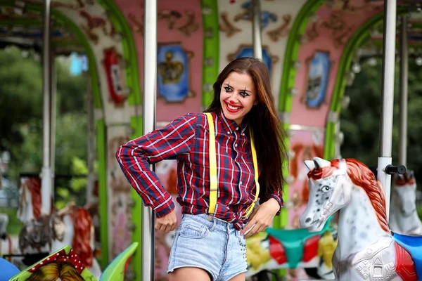 Linda chica en un payaso maquillaje — Foto de Stock