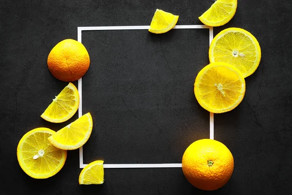 Orange citrus fruit on stone table. Orange background.