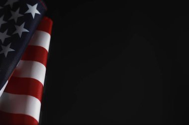 American flag on a mirror background. Symbol of the United States of America. Star-striped flag on black background. clipart
