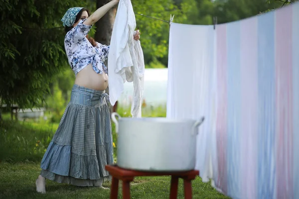 Pregnant Woman Hanging Wash Clothes Rope Drying — Stock Photo, Image