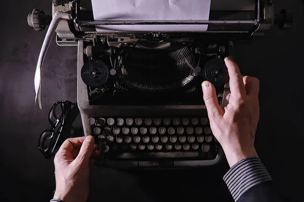 Vintage journalist tool. Typewriter retro. The writer is at work. Seal the novel. Journalist writer concept.