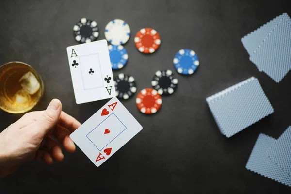 The concept card tricks and presentations. The concept of a sharpie in games. Flying cards in the air. A magician raises cards with the power of thought.