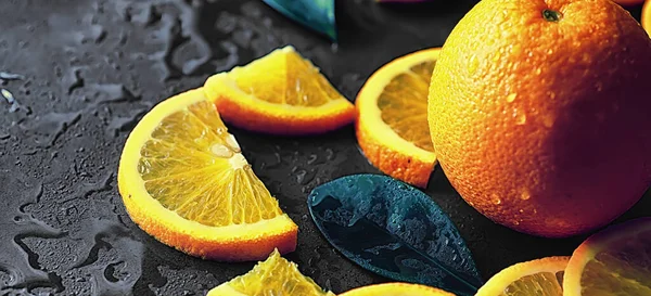 Orange citrus fruit on stone table. Orange background.