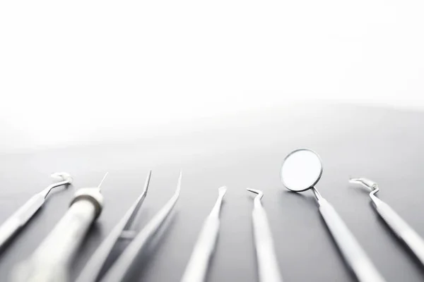 Equipment for the dental office. Orthopedic Instruments. Dental technician with work tools. Dentist metal tools.