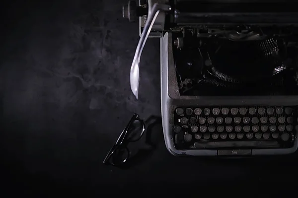 Vintage journalist tool. Typewriter retro. The writer is at work. Seal the novel. Journalist writer concept.