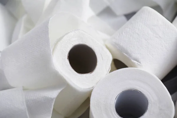 Toilet paper in a roll. Snow-white soft three-layer toilet paper. Lack hygiene products. Primary protection and disinfection.