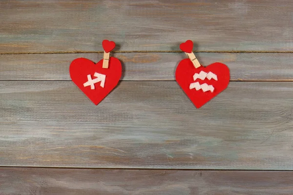 Sagittarius and Aquarius. signs of the zodiac and heart. wooden — Stock Photo, Image