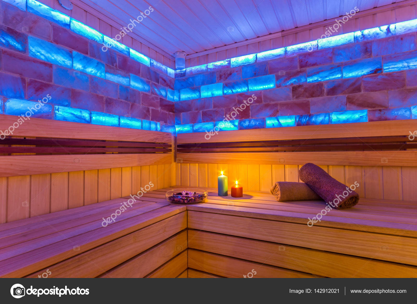 Sauna room with traditional sauna accessories Stock Photo by ©Domkrugom