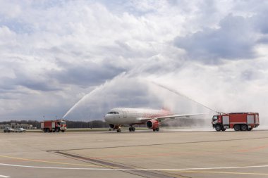 Vnukovo airport, Moscow - April 25, 2016 Inaugural flight of Airbus A319 Rossiya airlines clipart
