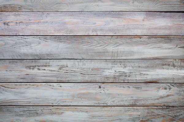 Grijze houten achtergrond met oude beschilderde planken — Stockfoto