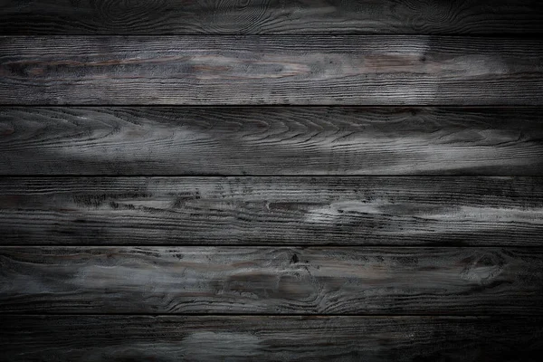 Grauer Holzhintergrund mit alten bemalten Brettern — Stockfoto