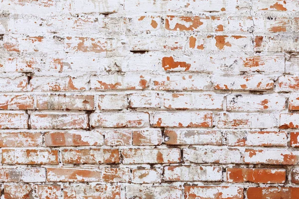 Rustic red brick background with white paint — Stock Photo, Image