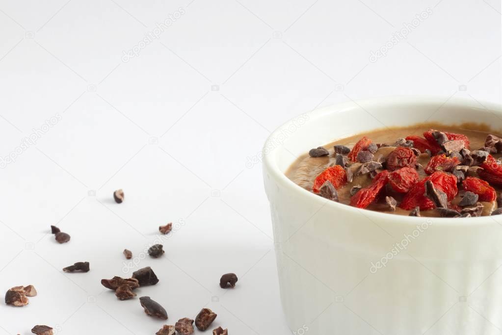 Healthy pudding made from the cauliflower, with cocoa nibs and goji berries.