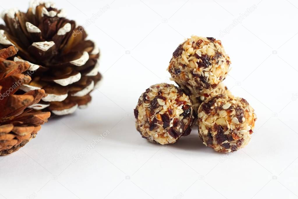 Handmade vegan balls made from coconut, cranberries and nuts.