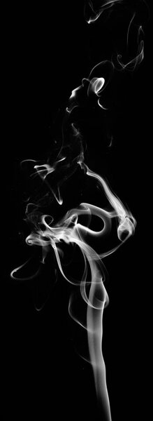 White fantasy smoke on black background close up