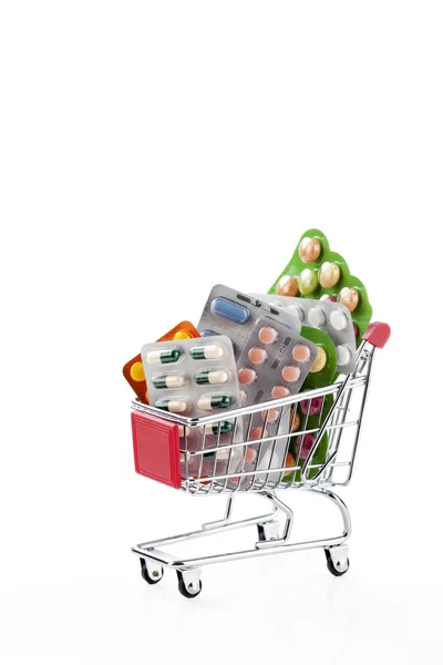 Drugs and pills in supermarket trolley — Stock Photo, Image