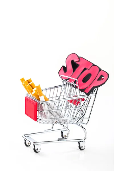Cigarettes in shopping cart — Stock Photo, Image