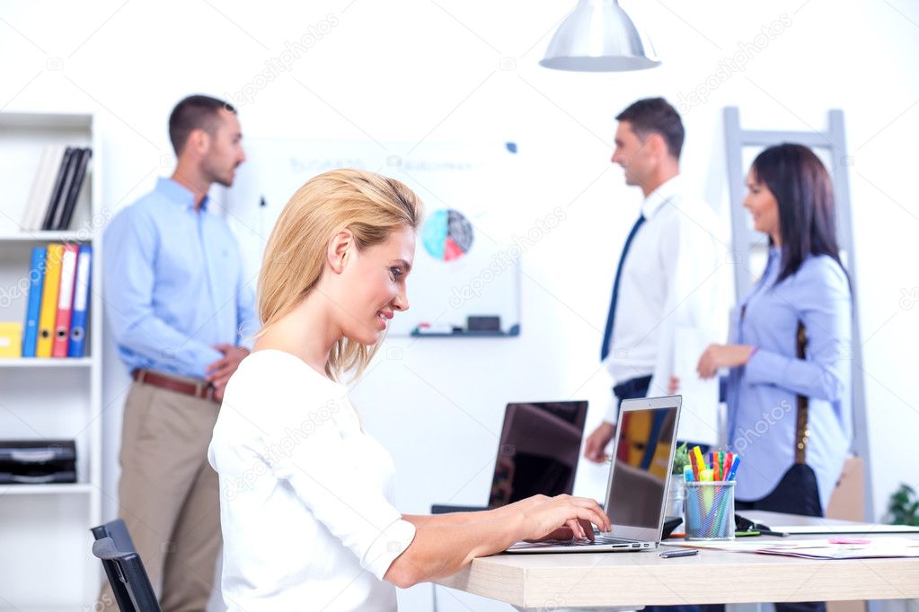 Business People Having Meeting In Office