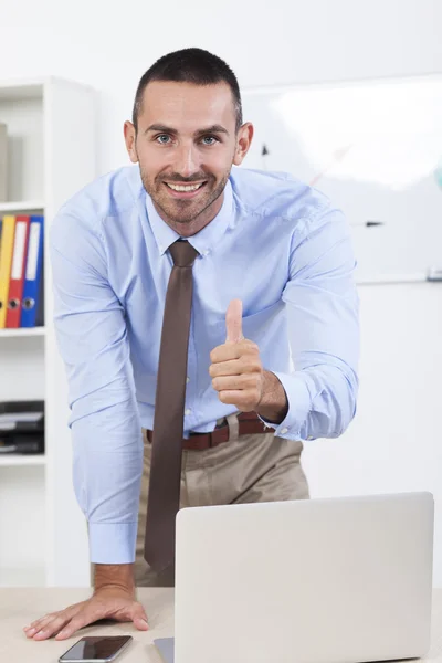 Happy business man showing thumbs up — Stock Photo, Image