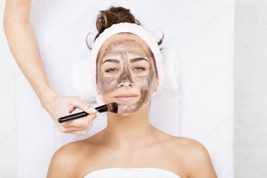 woman at the spa during a facial treatment