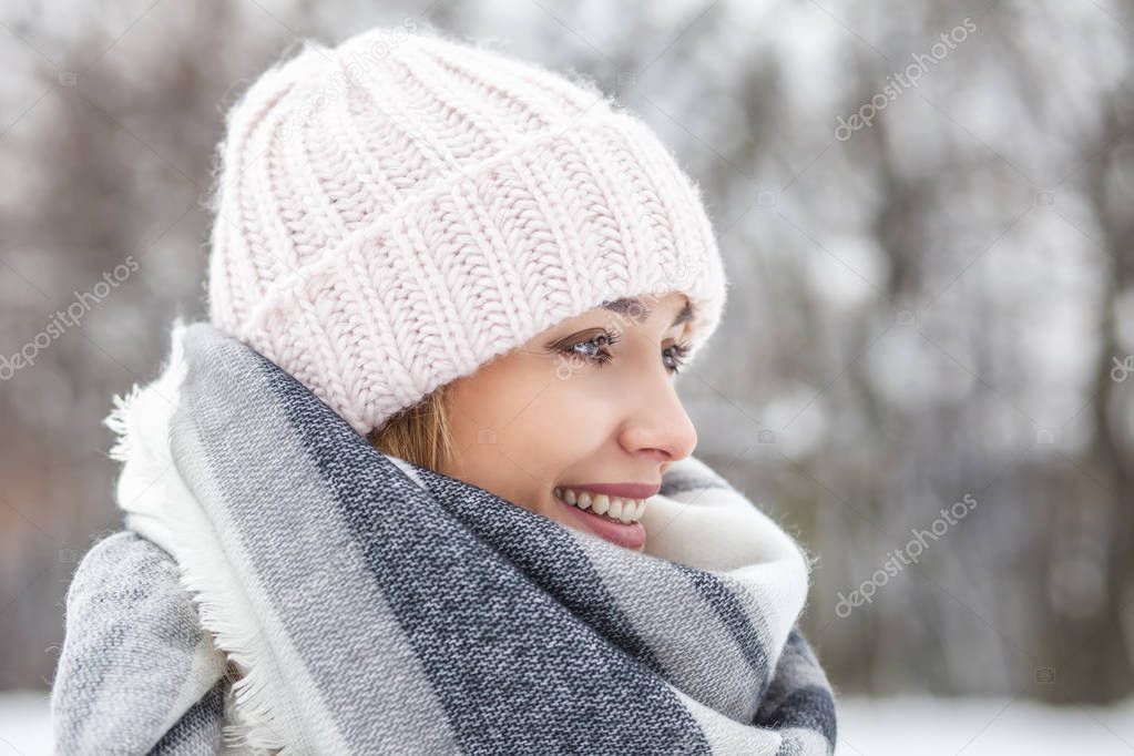 beautiful blonde woman in in the winter park