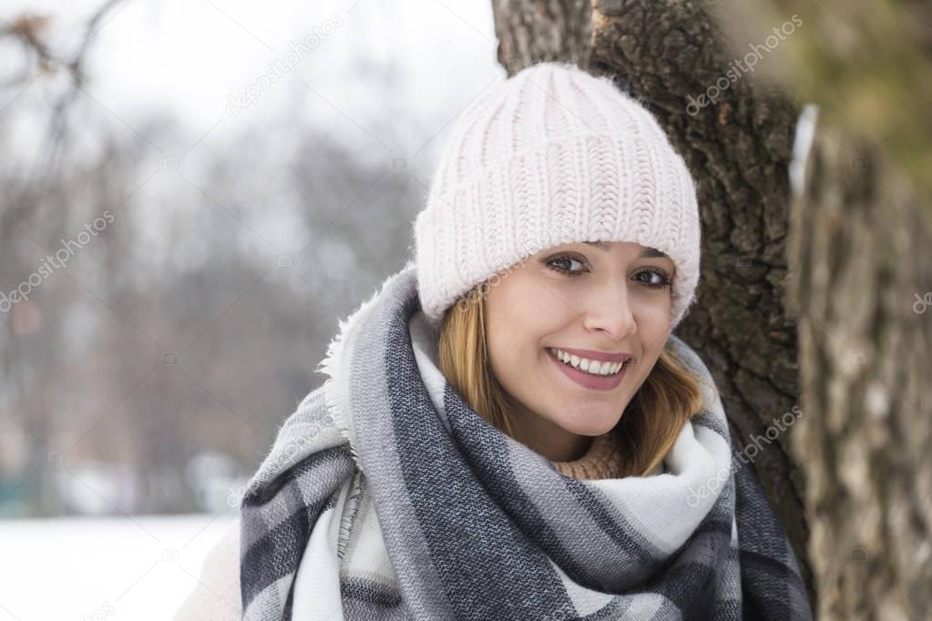 beautiful blonde woman in in the snow
