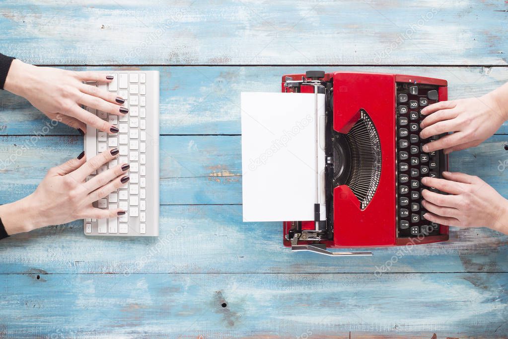 Old typewriter and laptop