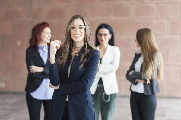 Successful woman leading a business group — Stock Photo, Image