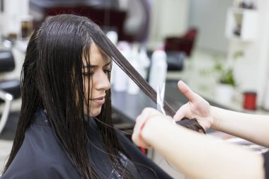 Woman in a hair salon, Haircut