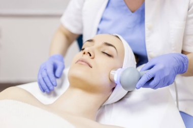 Ultrasound cavitation, face skin anti age treatment clipart