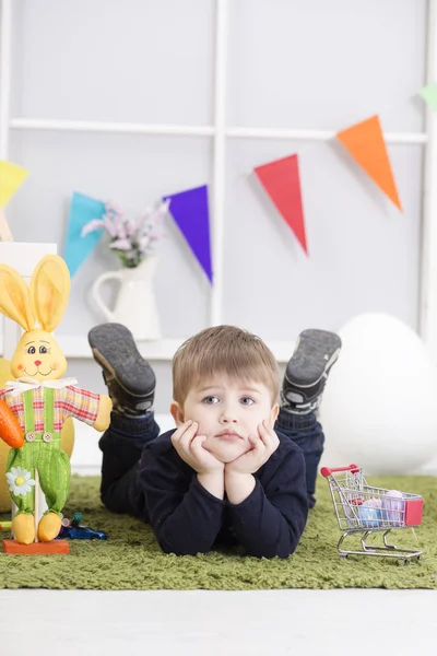 Unhappy baby boy on Easter day — Stock Photo, Image