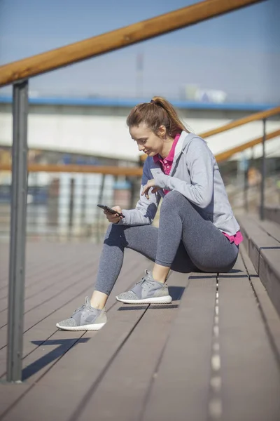 A young woman on recreation and jogging — Stock Photo, Image