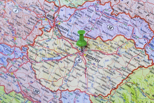 Green push pin pointing at Budapest — Stock Photo, Image