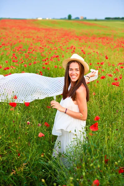 Woman in the field of red poppies — Stock Photo, Image