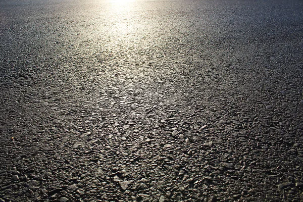 Υφή Άσφαλτου Δρόμου Αυτοκινητόδρομος Επιφάνεια Αντανάκλαση Ήλιο — Φωτογραφία Αρχείου