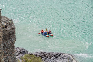 River Katun, Altai Republic, Russia - September 13, 2019: tourists-rafters rafting on mountain river