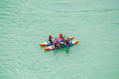 River Katun, Altai Republic, Russia - September 13, 2019: tourists-rafters rafting on mountain river