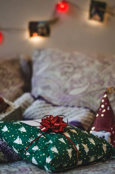 Gifts on the bed. Christmas or St. Valentine concept