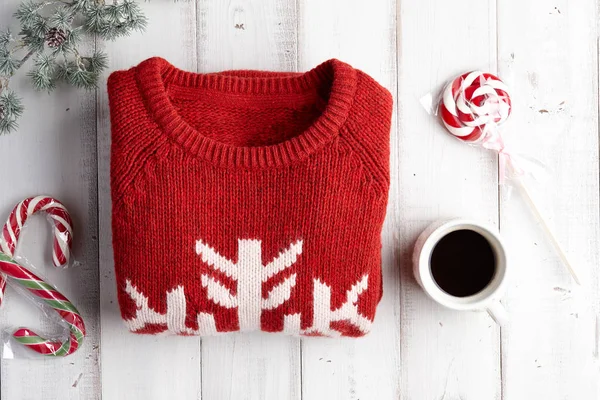 Téli háttér, pulóver és a nyalókák — Stock Fotó