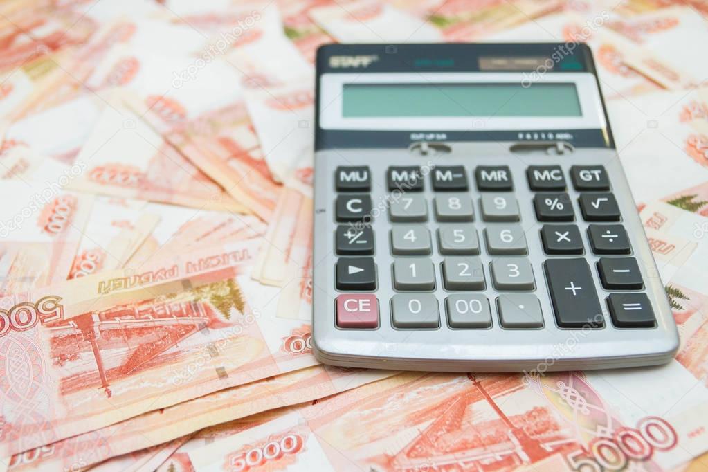 The calculator lies on big Russian money
