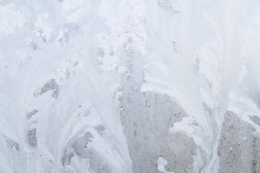 Kış soğuk desenleri donmuş buz penceresinde