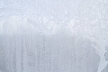 Kış soğuk desenleri donmuş buz penceresinde