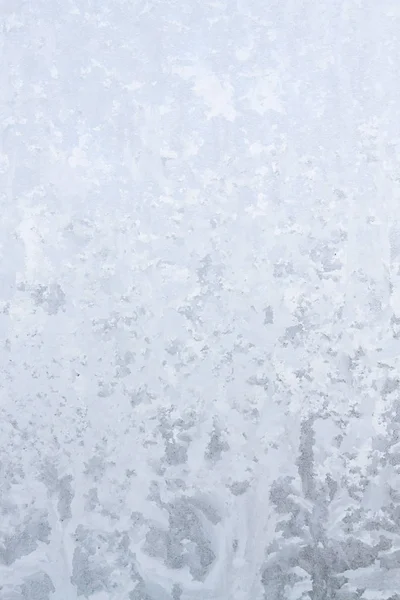 Winter frosty patterns on the frozen ice window — Stock Photo, Image