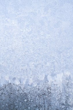 Kış soğuk desenleri donmuş buz penceresinde